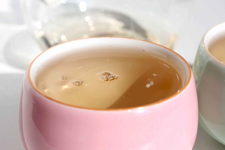 Jasmine tea in small pink cup | Available online